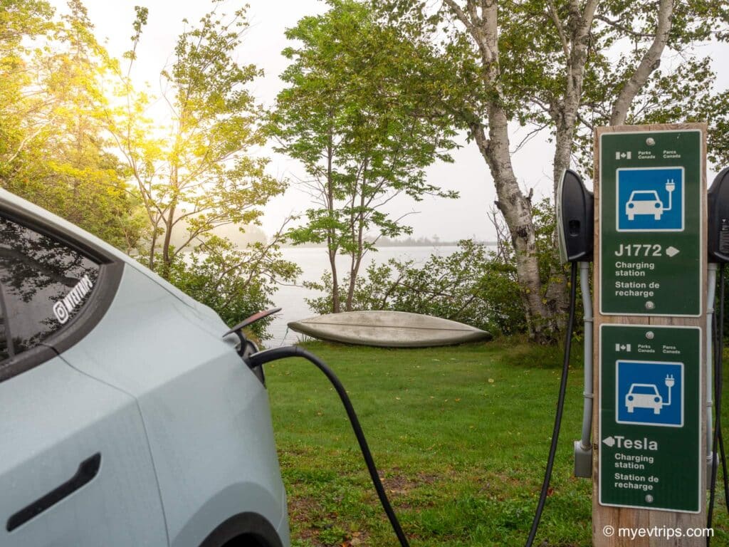 Tesla Model Y plugged in at a Parks Canada Cabot Trail Charging station 
