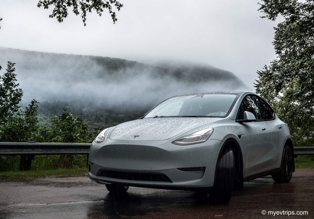 Tesla Model Y in the rain on the Cabot Trail