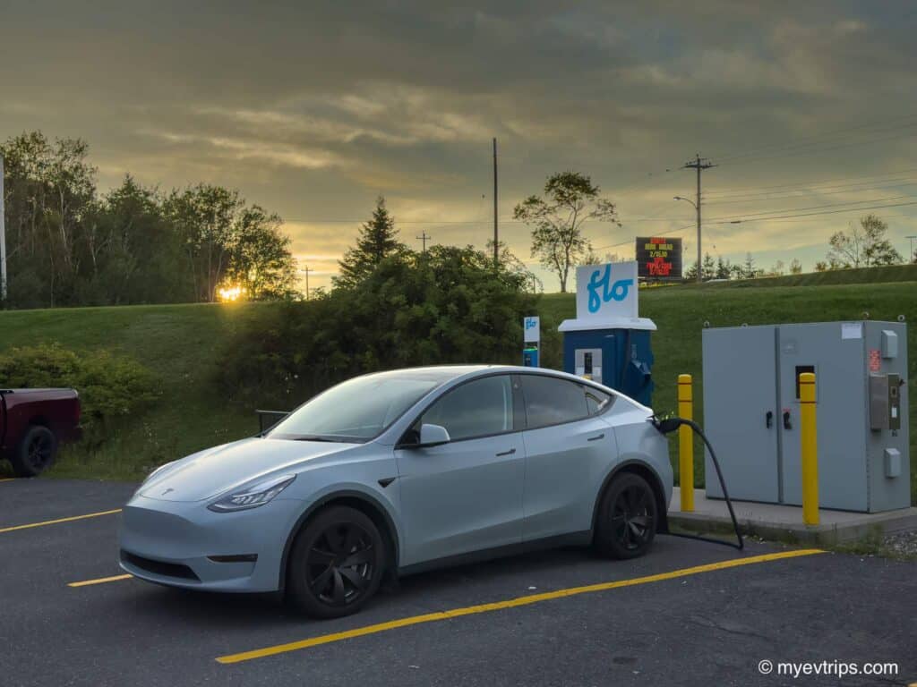 Tesla Model Y charging at a Flo charger in North Sydney, Nova Scotia