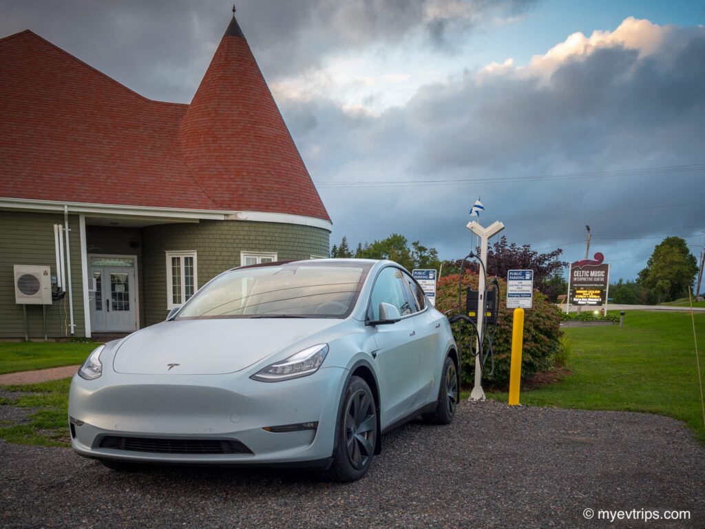 Tesla Model Y charging in front of the Celtic Music Center on Cape Breton Island, Nova Scotia Canada