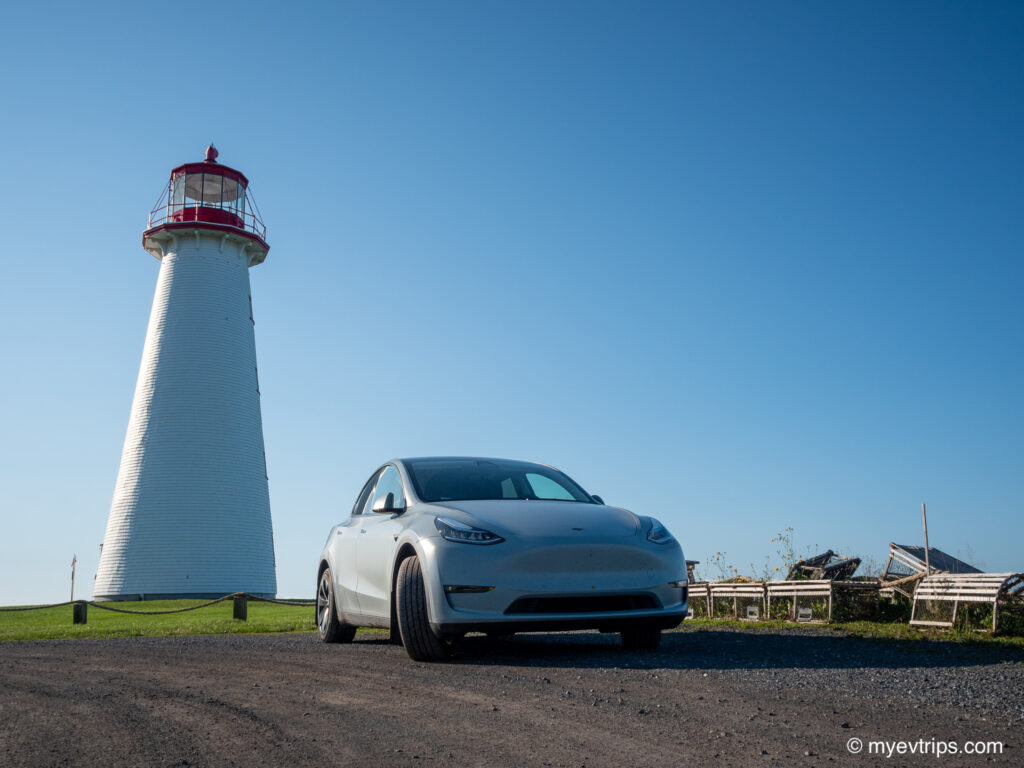 Point Prim lighthouse PEI with Tesla Model Y in front