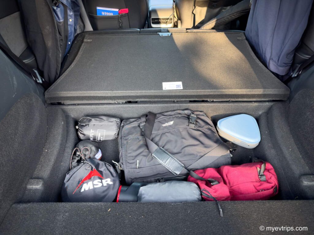 Camping supplies in Tesla Model Y trunk storage
