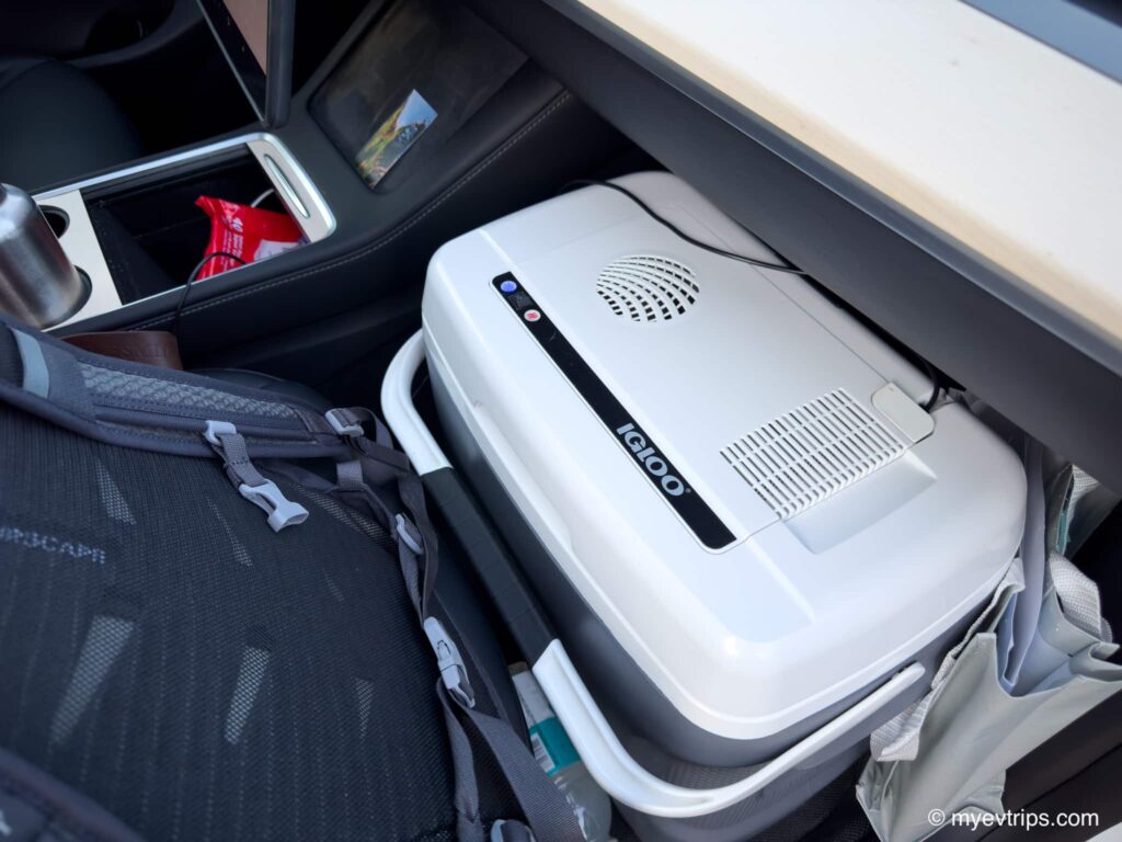 Igloo cooler in front seat of Tesla Model Y