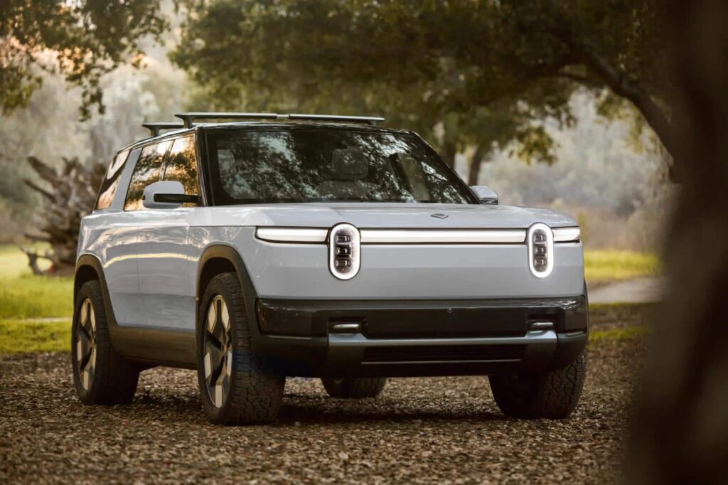 Rivian R2 from the front with signature light design.