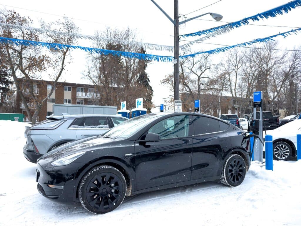 Hertz Tesla Model Y charging at FLO station in Edmonton 