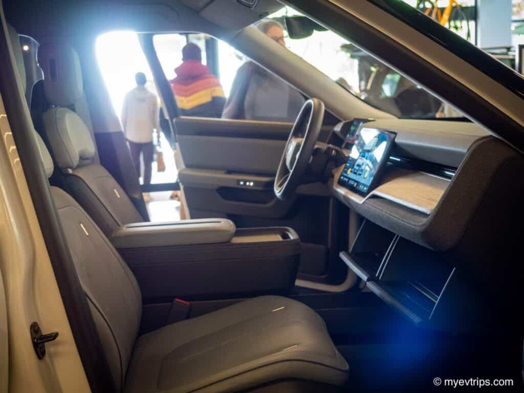 Rivian R2 display passenger side interior with dual gloveboxes