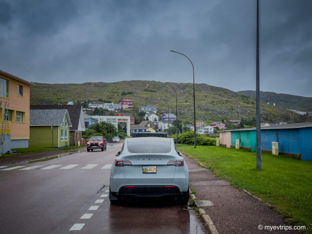 Tesla Model Y Driving to Saint Pierre in an EV parked