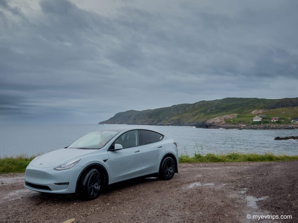 Tesla Model Y parked on the far side of Saint Pierre