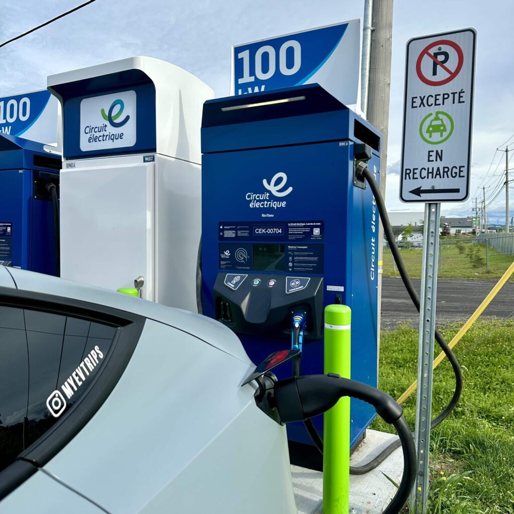 Close up of Tesla Model Y charging at Electric Circuit 100KW charger