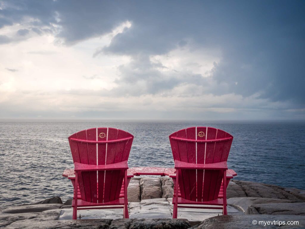 Parks Canada red chairs at the Cap-de-Bon-Désir Interpretation and Observation Centre
