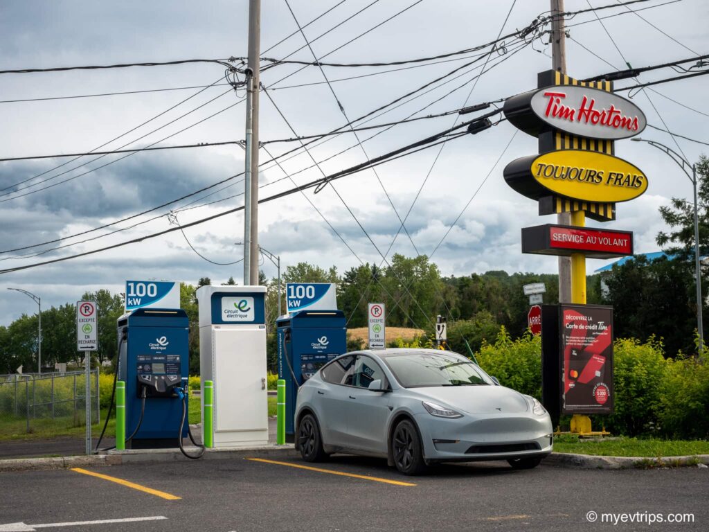 Tesla Model Y charging at a Circuit Électrique in Amqui Quebec on start of an New Brunswick Road Trip