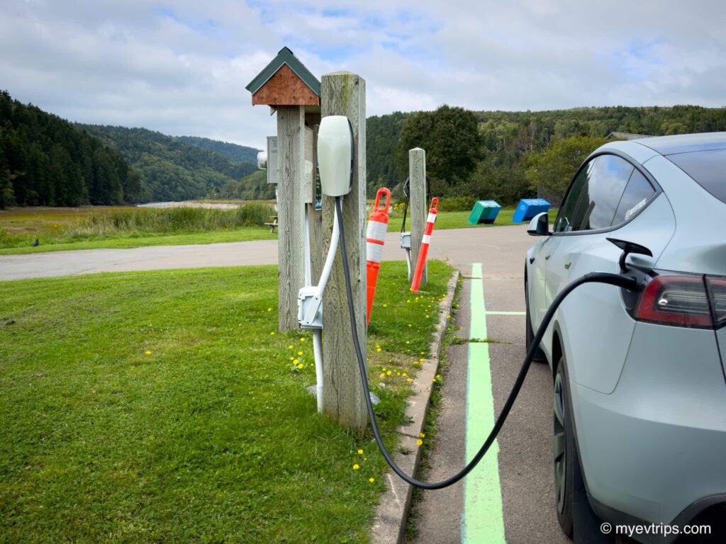 Tesla Model Y charging outside of Alma, New Brunswick
