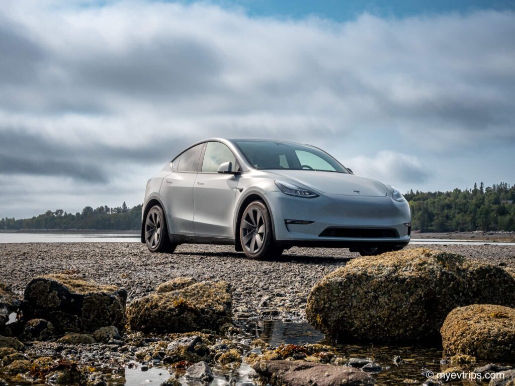 Tesla Model Y on ocean floor at Saint Andrews at low tide
