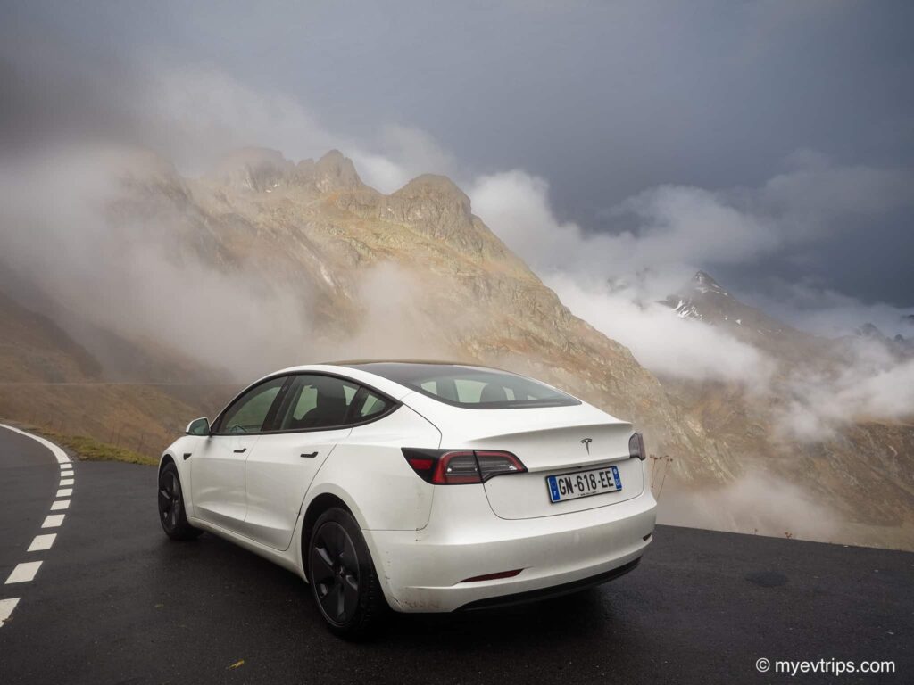 Tesla Model 3 parked on the  Susten Pass durring a Swiss Alps EV Road Trip