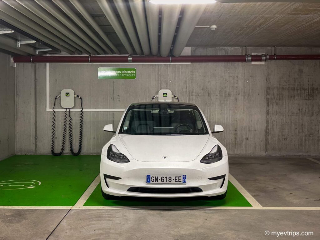 Tesla Model 3 parked at a hotel Switzerland ev charging stall