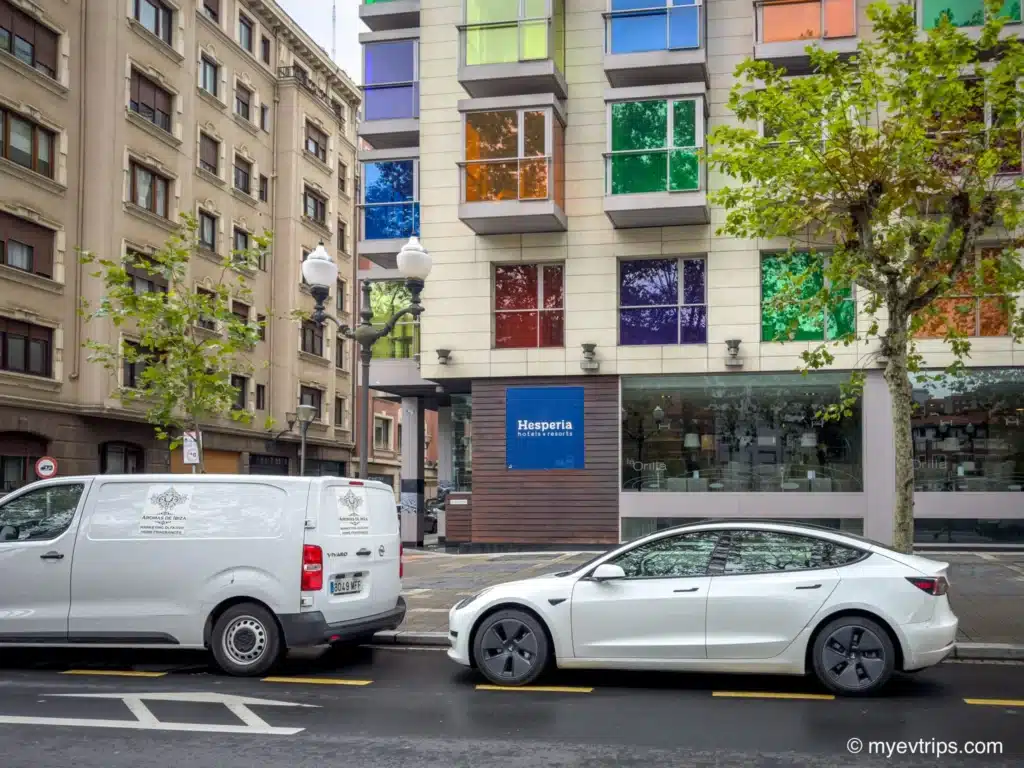 Tesla Model 3 parked in front of the Hesperia Hotel, Bilbao