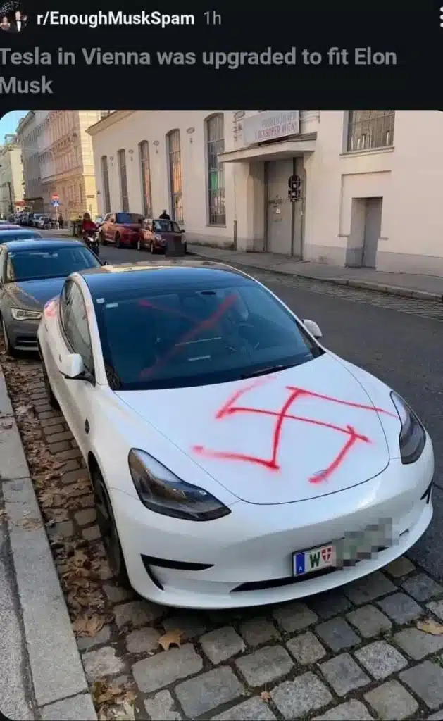 swastika spray painted on a Tesla Model 3 in Vienna, backlash from Elon Musk nazi salute.