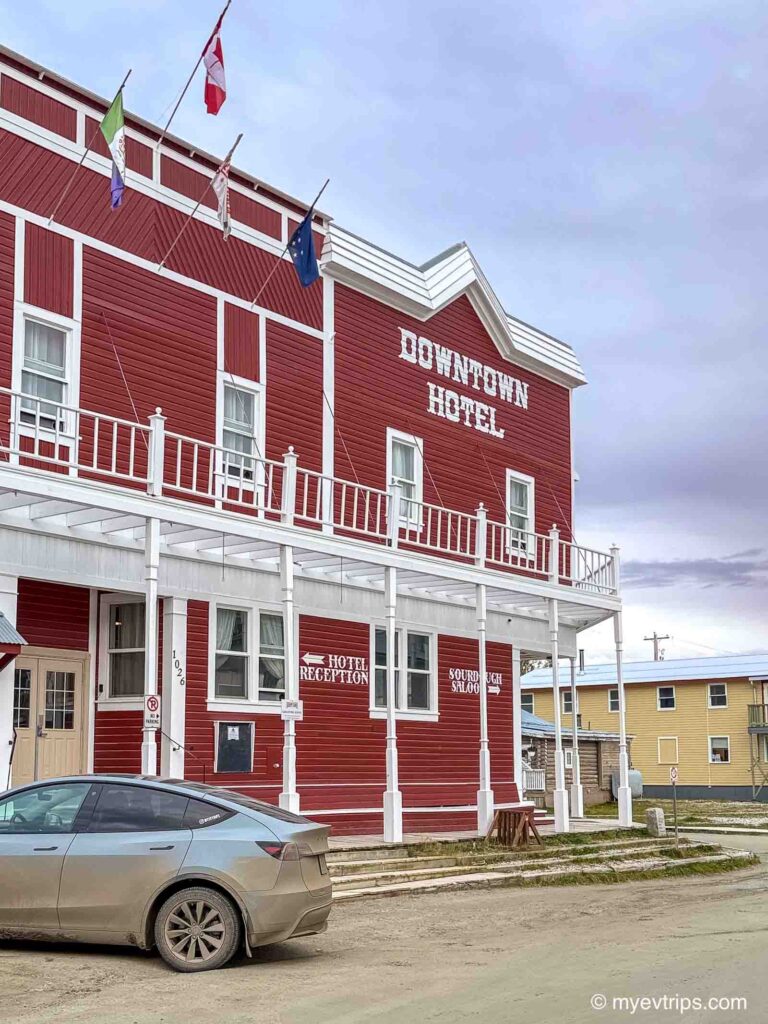 Tesla Model Y parked at the Downtown Dawson Hotel in Dawson City Yukon